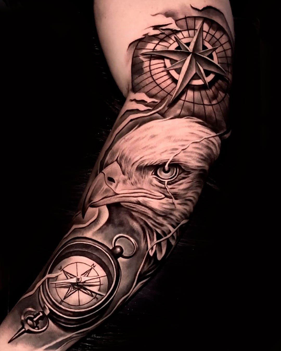 Eagle and face black and grey realism sleeve by Lucas Nascimento